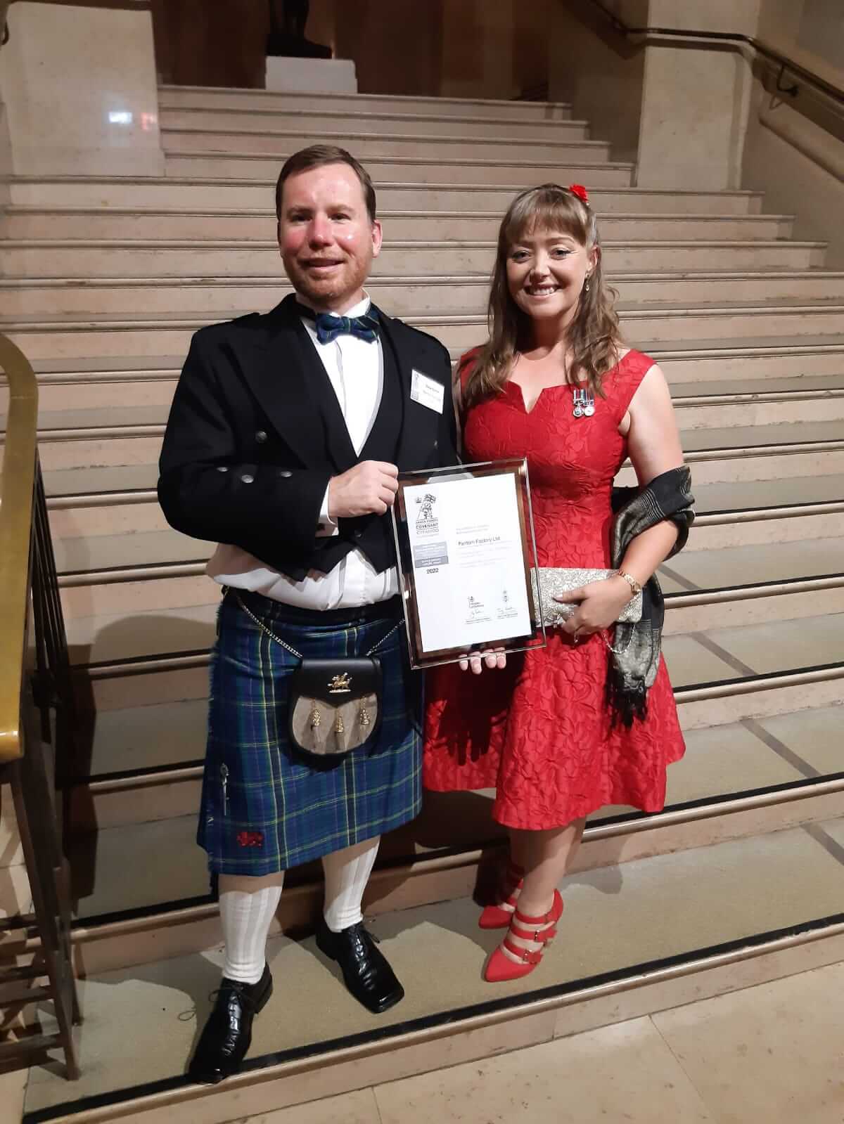 award photo on steps